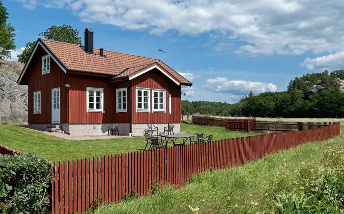 Red board fence around a house